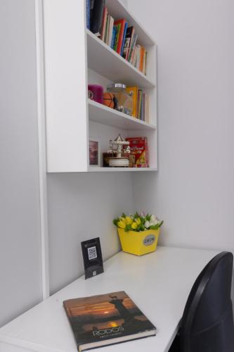 a book sitting on top of a desk at Silver Palm House Ixia, Rhodes in Ixia