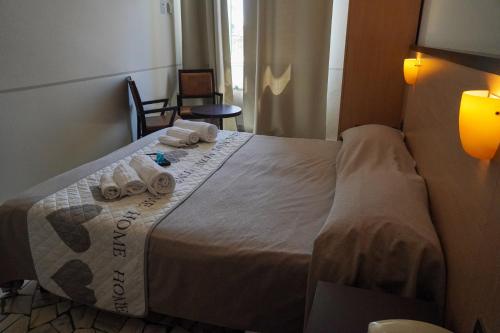 Postel nebo postele na pokoji v ubytování Hotel Cilene