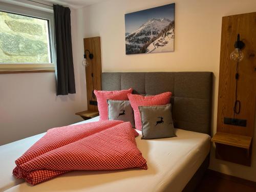 En eller flere senge i et værelse på Alp Apart Niederthai
