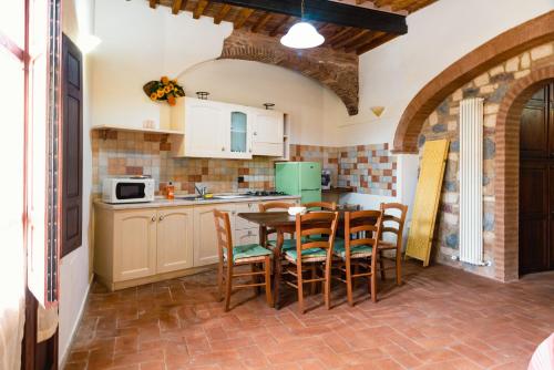 Kuchyň nebo kuchyňský kout v ubytování Appartamento rustico toscano
