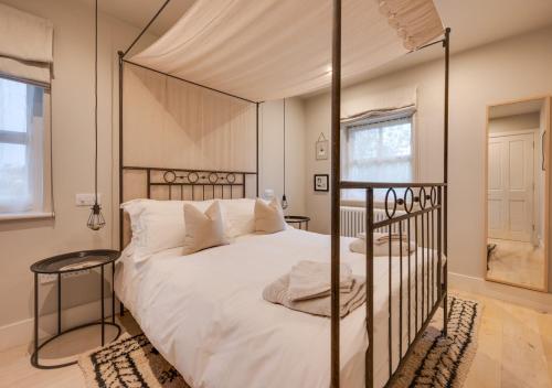 En eller flere senge i et værelse på Interludes