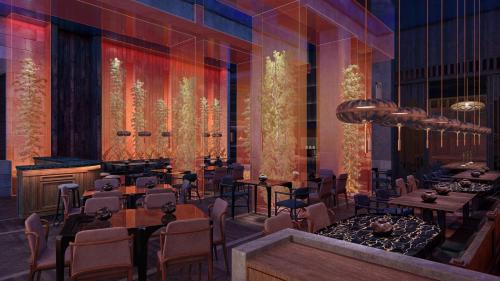a rendering of a restaurant with tables and chairs at Zemi Miches Punta Cana All-Inclusive Resort, Curio by Hilton in Miches