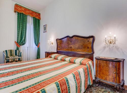 En eller flere senge i et værelse på Ca' Derai