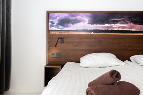 Ö Seaside Suites & SPAにあるベッド