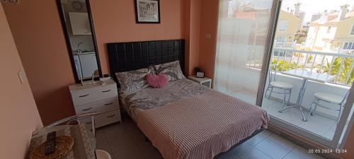 Ένα ή περισσότερα κρεβάτια σε δωμάτιο στο Estudio junto al Mar