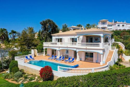 an aerial view of a villa with a swimming pool at Parque da Floresta villa 209 with pool on golf resort in Budens