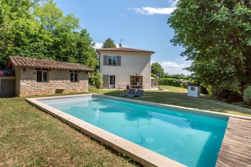 a large swimming pool in front of a house at Le Mas - House with swimming pool in a privileged environment in Saint-Didier-au-Mont-dʼOr