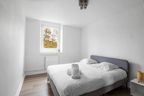 Postel nebo postele na pokoji v ubytování Sweet Honey Briey