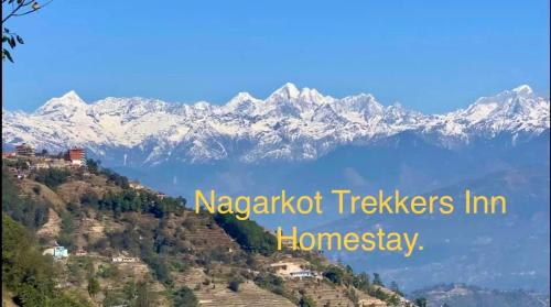 a mountain with snow covered mountains in the background at Nagarkot Trekkers Inn in Nagarkot