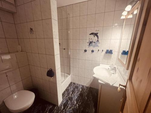Koupelna v ubytování Ferienwohnung Kimi in Wieck