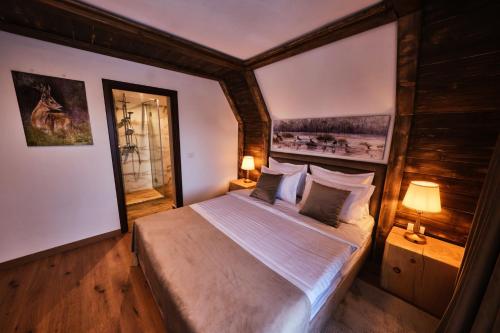 Ένα ή περισσότερα κρεβάτια σε δωμάτιο στο LUMA CHALET