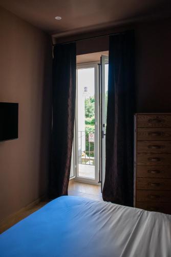 Ένα ή περισσότερα κρεβάτια σε δωμάτιο στο Stile Raro Suite