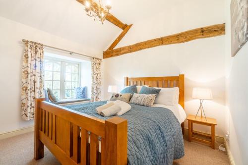 Кровать или кровати в номере The Farmhouse
