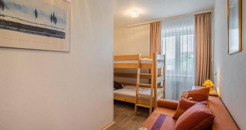 Postel nebo postele na pokoji v ubytování EA Hotel Lipno
