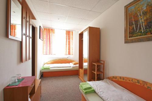 Postel nebo postele na pokoji v ubytování Apartmány HABURA