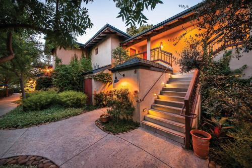 a house with a staircase leading up to a house at Appellation Lodi - Wine & Roses Resort and Spa in Lodi