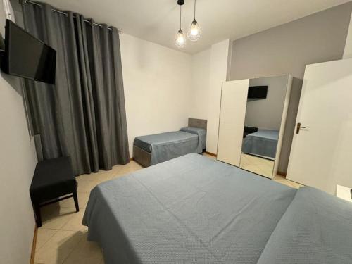 Katil atau katil-katil dalam bilik di Praia Guest House 2