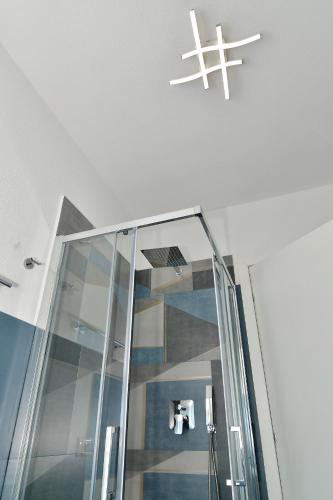 a plane hanging from the ceiling of an elevator at Le Spiagge di San Teo in San Teodoro