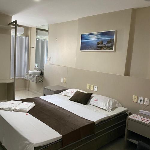 Ένα ή περισσότερα κρεβάτια σε δωμάτιο στο Onix Hotel Aeroporto