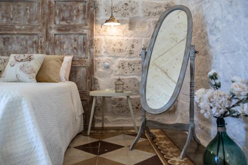 Ένα ή περισσότερα κρεβάτια σε δωμάτιο στο Mestru Rafeli Art