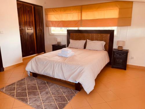 Säng eller sängar i ett rum på Villa Dune Rouge de la Siesta