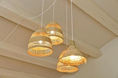 a group of lights hanging from a ceiling at Agriturismo Biancarda in Massignano