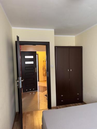 Apartment in the center of Elkにあるベッド