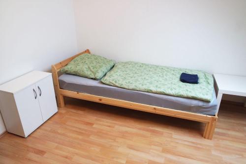 Ένα ή περισσότερα κρεβάτια σε δωμάτιο στο Nice Apartment in Vöhringen