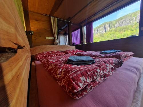 Postel nebo postele na pokoji v ubytování Bivak 14 - Krásný malý apartmán pro milovníky skal a přírody