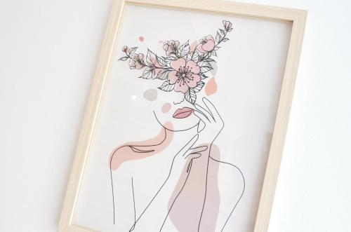a picture of a woman with a flower crown on her head at Sorelle Apartment in Tivat