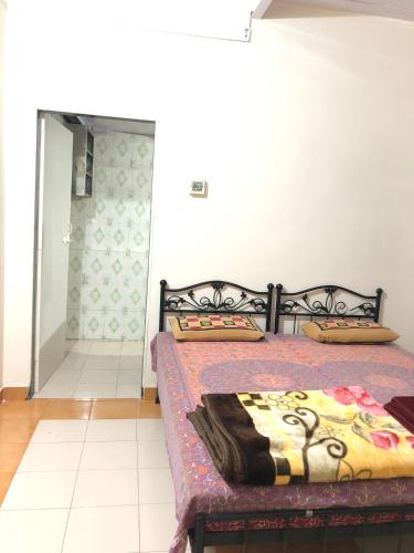 Postel nebo postele na pokoji v ubytování Sameena Guest House