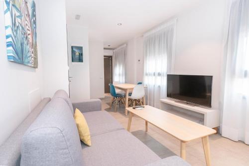 TV a/nebo společenská místnost v ubytování Sholeo Lodges Santa Catalina Flats