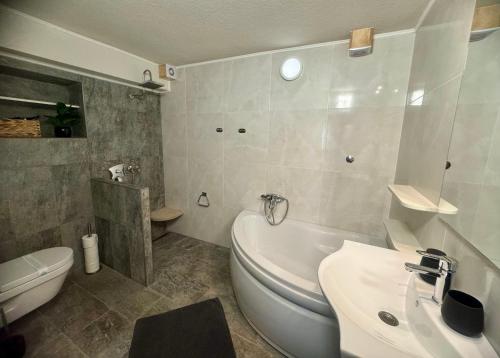 Kúpeľňa v ubytovaní Apartment Urban Oasis