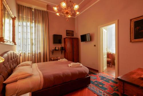 Televisyen dan/atau pusat hiburan di Ai tre cedri B&B