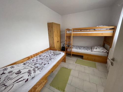 Postel nebo postele na pokoji v ubytování Apartmány Bella Moravia