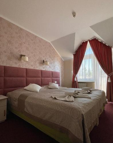 Ein Bett oder Betten in einem Zimmer der Unterkunft Damroka