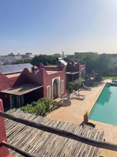 a view of a house with a swimming pool at TARGANINE Lodge in Essaouira