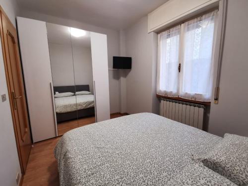 Postel nebo postele na pokoji v ubytování Appartamento Casa Corrada