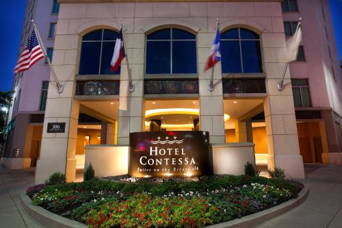 a hotel commissioner sign in front of a building at Hotel Contessa - Suites on the Riverwalk in San Antonio