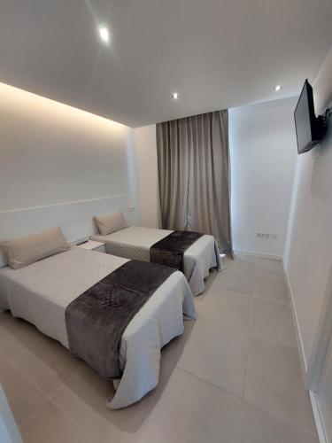 Postel nebo postele na pokoji v ubytování Sun Sea villa-heated pool