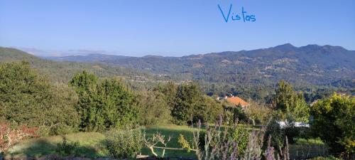 a view of a valley with trees and mountains at Airiños de Mondariz in Mondariz