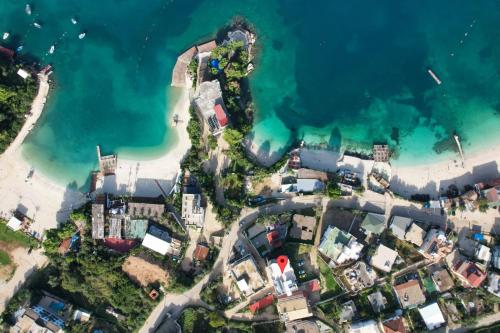 an aerial view of the beach and the ocean at Hotel Meta Ksamil in Ksamil