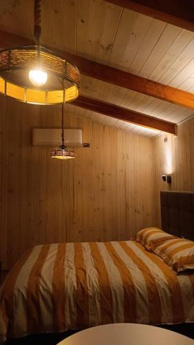 Ένα ή περισσότερα κρεβάτια σε δωμάτιο στο Refugio Natural en Malalcahuello