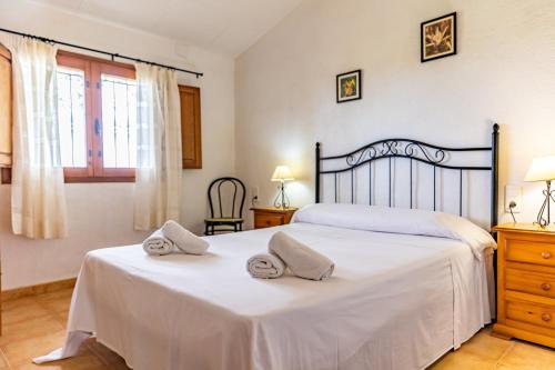 Llit o llits en una habitació de Casa Rous-Riumar 2