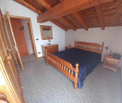 Postel nebo postele na pokoji v ubytování LA CASETTA DELLE NUVOLE