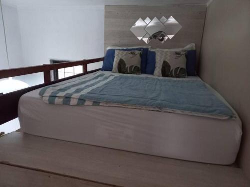 Ein Bett oder Betten in einem Zimmer der Unterkunft Loft Maior Aconchegante