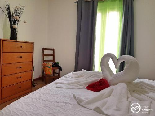 Katil atau katil-katil dalam bilik di Home Azores - Lagoa's Place