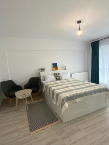 Ένα ή περισσότερα κρεβάτια σε δωμάτιο στο Apartament BogDAnna