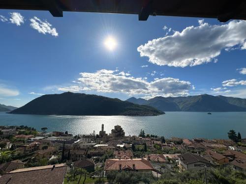 a view of a city and a body of water at Appartamento con vista lago - Dosso Lakeview in Sale Marasino