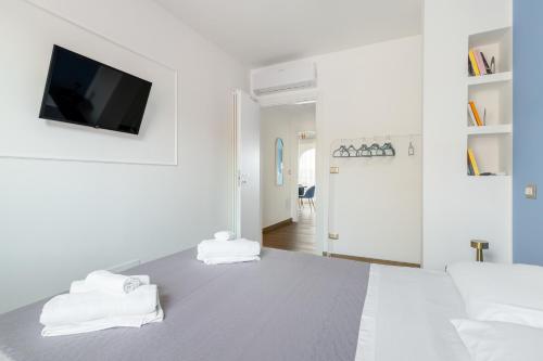เตียงในห้องที่ Casa Vacanze Maddalena - Palazzetto sul Lago - Diamante Blu